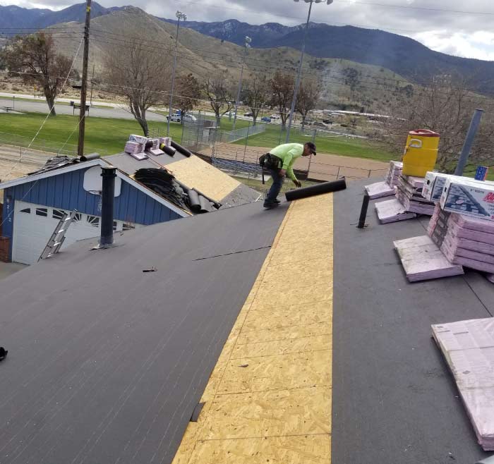 bakersfield-roofing Experienced roofing contractorpreparing roof for a roof installation in a residential neighborhood