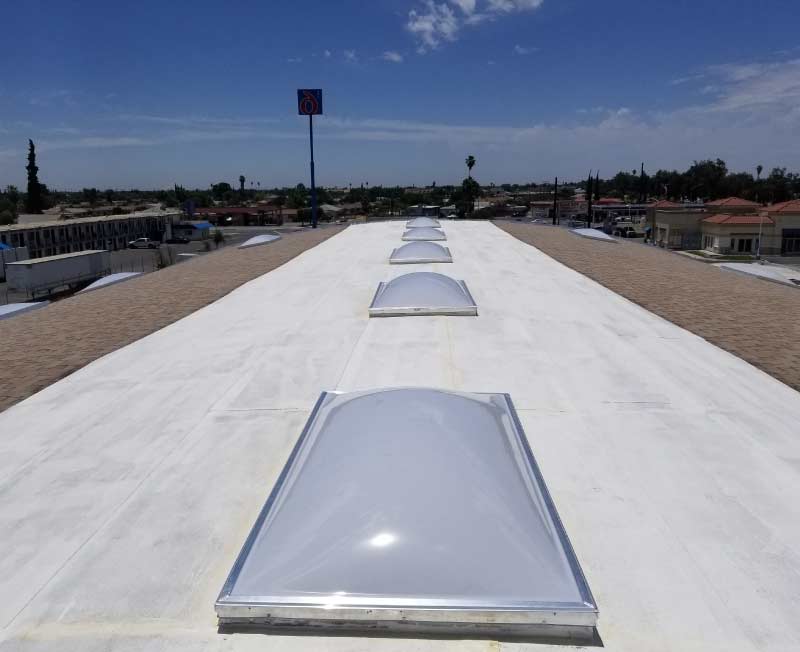 Durable new arvin commercial roofing installation for a business property.