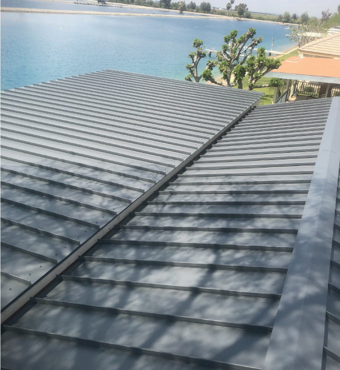 Durable new wasco commercial metal roofing installation for a residential  property.